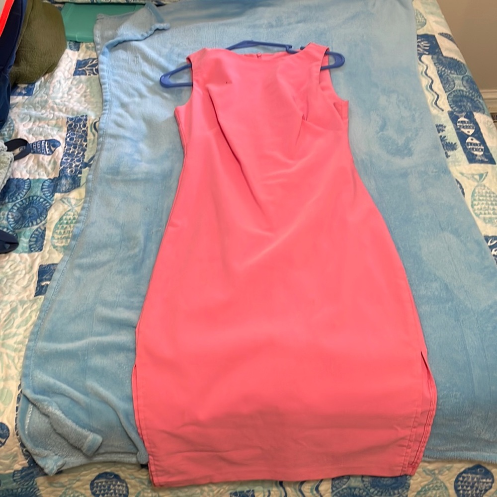 Pink dress doesn’t have tags but believe it was a 0-2 back in my skinny days.